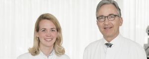 Dr. Carolin Milojcic und Prof. Dr. Frank G. Holz