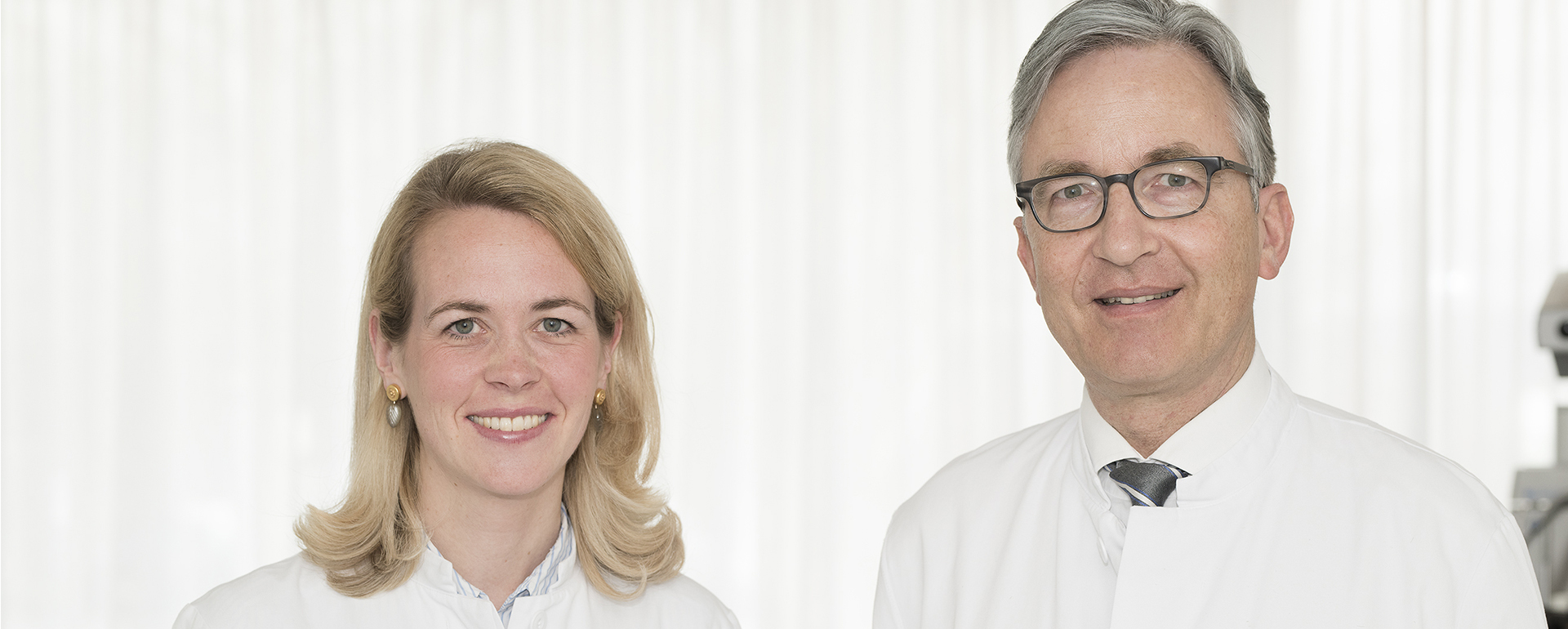 Dr. Carolin Milojcic und Prof. Dr. Frank G. Holz